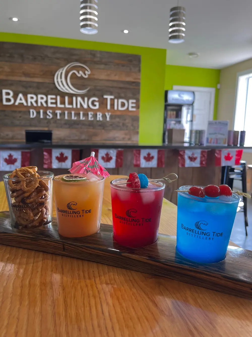 Cocktail flights lined up at the bar