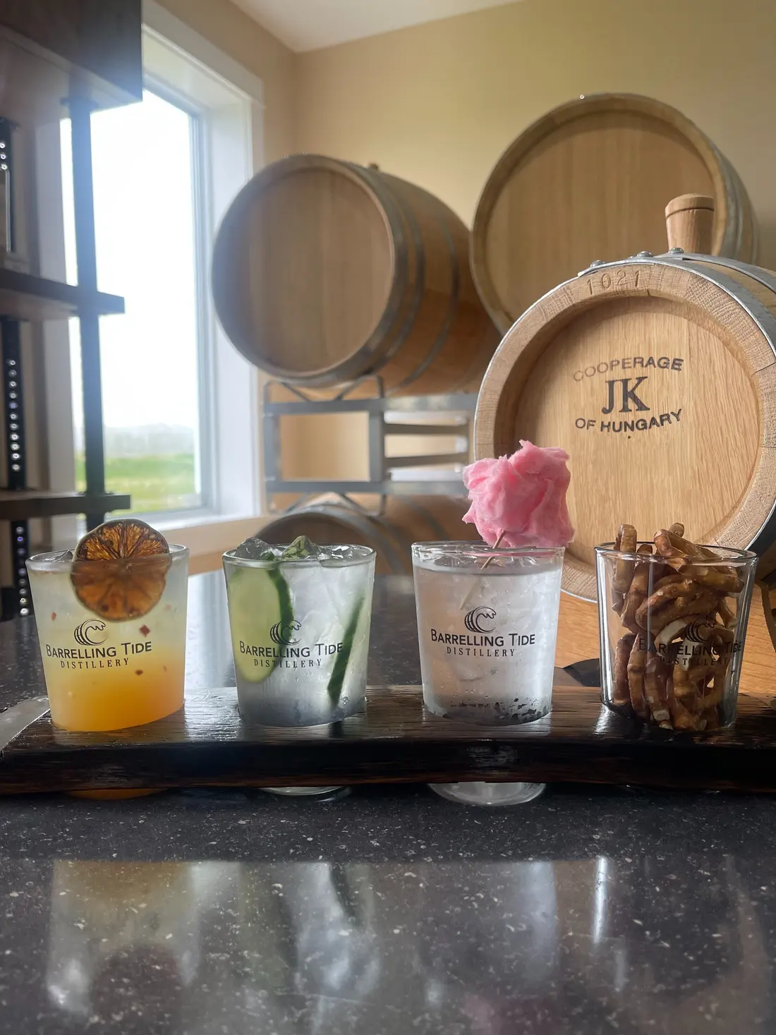 The Barrelling Tide tasting room with barrels on the wall